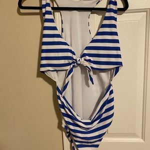 Blue and white striped bathing suit